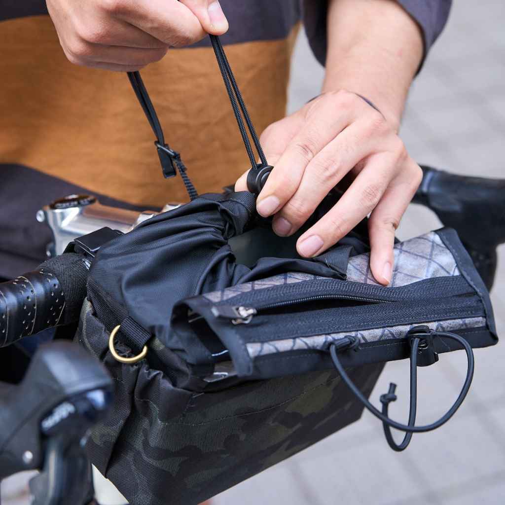 OUTER SHELL ADVENTURE* drawcord handlebar bag (multicam black/2024